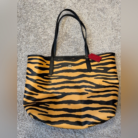 Coach Handbags - COACH Tiger Print Leather Tote Bag in Yellow and Black